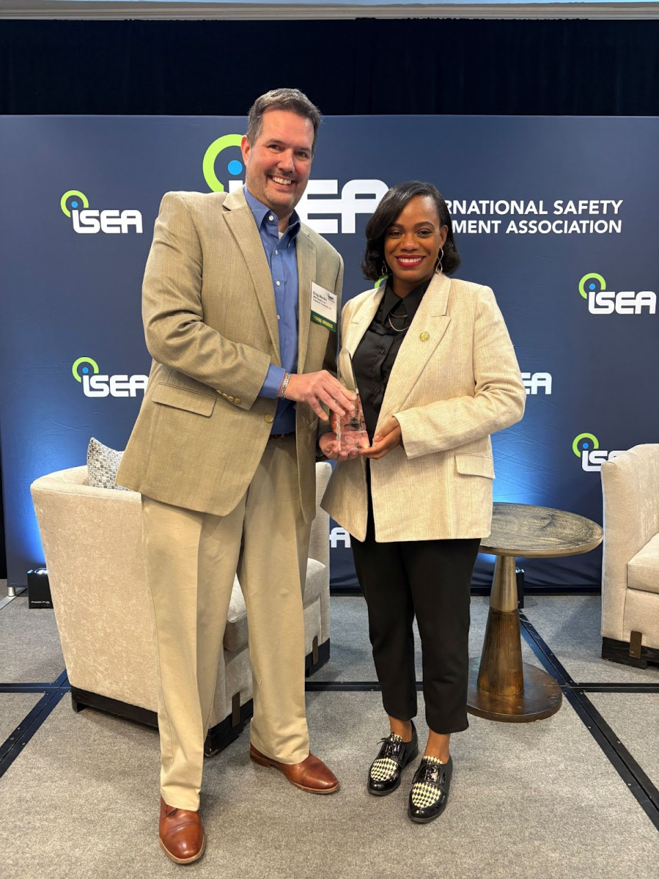 Rep. Lee receiving ISEA award